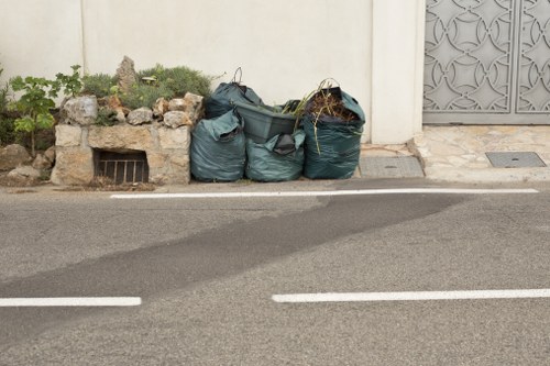 Professional rubbish collection team in East London