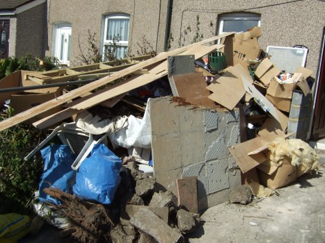 Professional garage clearance team at work